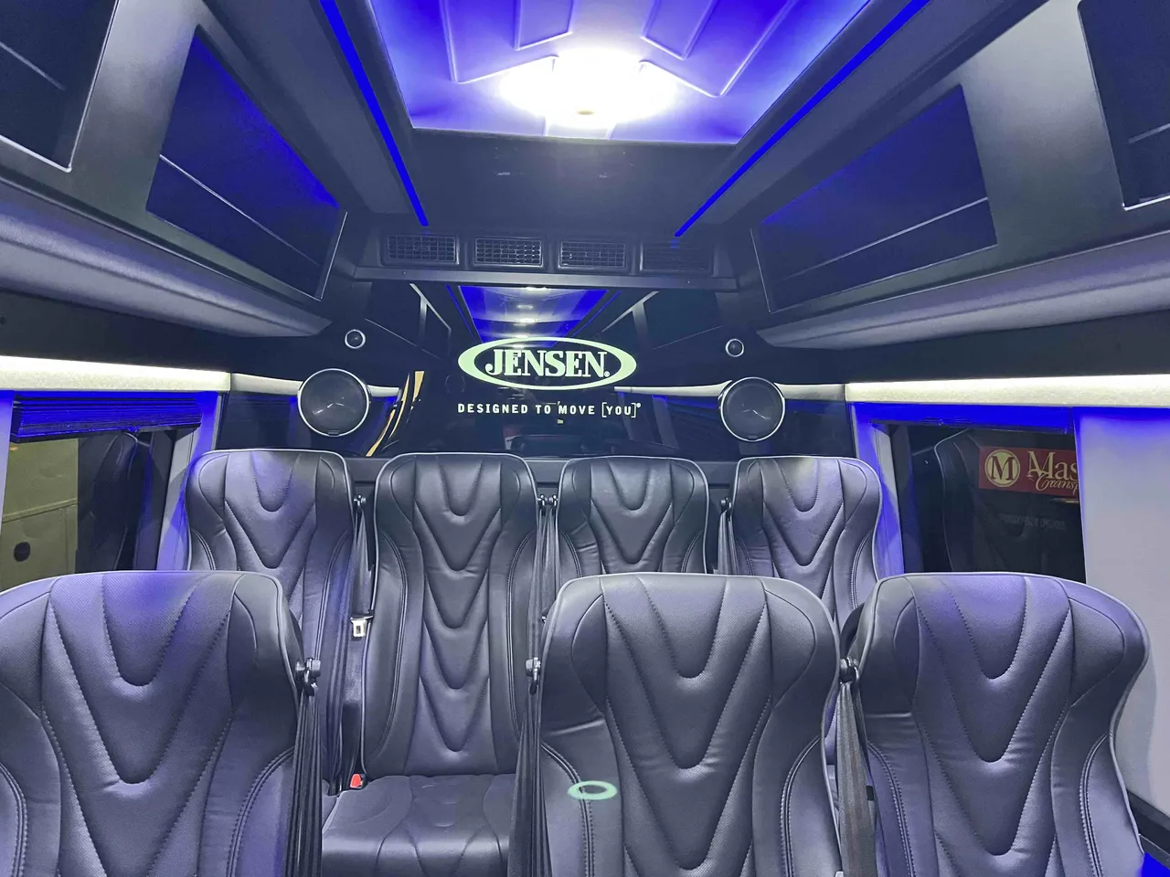 14 Passenger 2024 Mercedes-Benz Executive Sprinter cabin view with captain's chairs, LED accent lighting and LED ceiling lighting