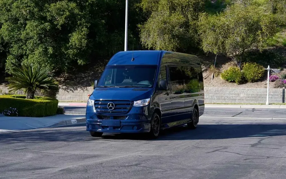 Blue Luxury Sprinter Shuttle Van to rent