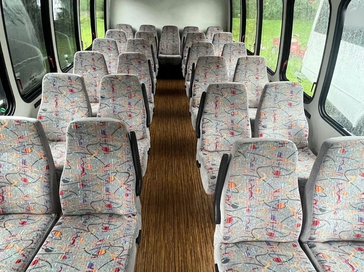 White Chevrolet C45 Shuttle Bus, angle 2