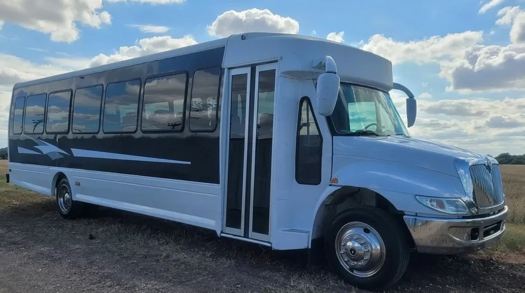 White 27 Passenger Executive Shuttle Bus to rent