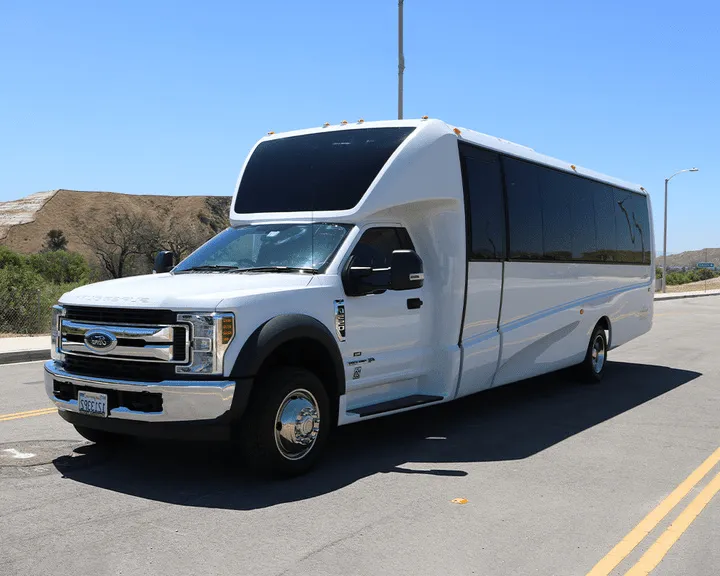 Ford F550 Executive Mini Coach White Ford F550 Executive Mini Coach with tinted windows