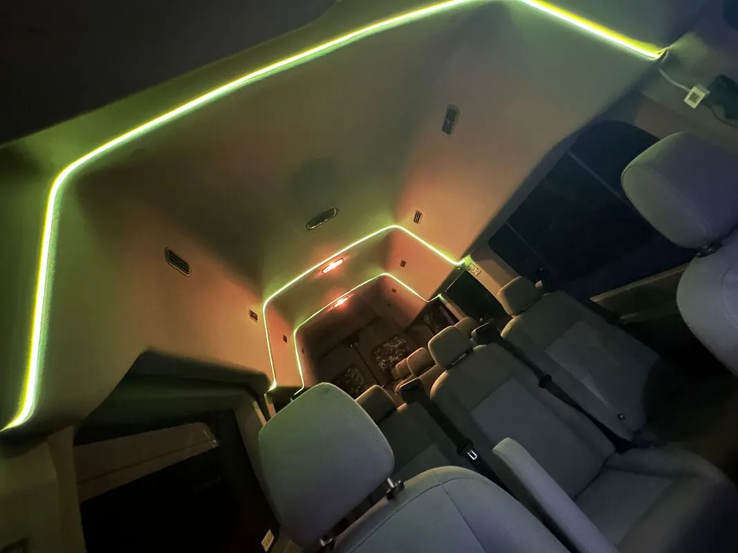 Ford Transit Van cabin view, angle 2 with high-roof cabin and LED ceiling lighting