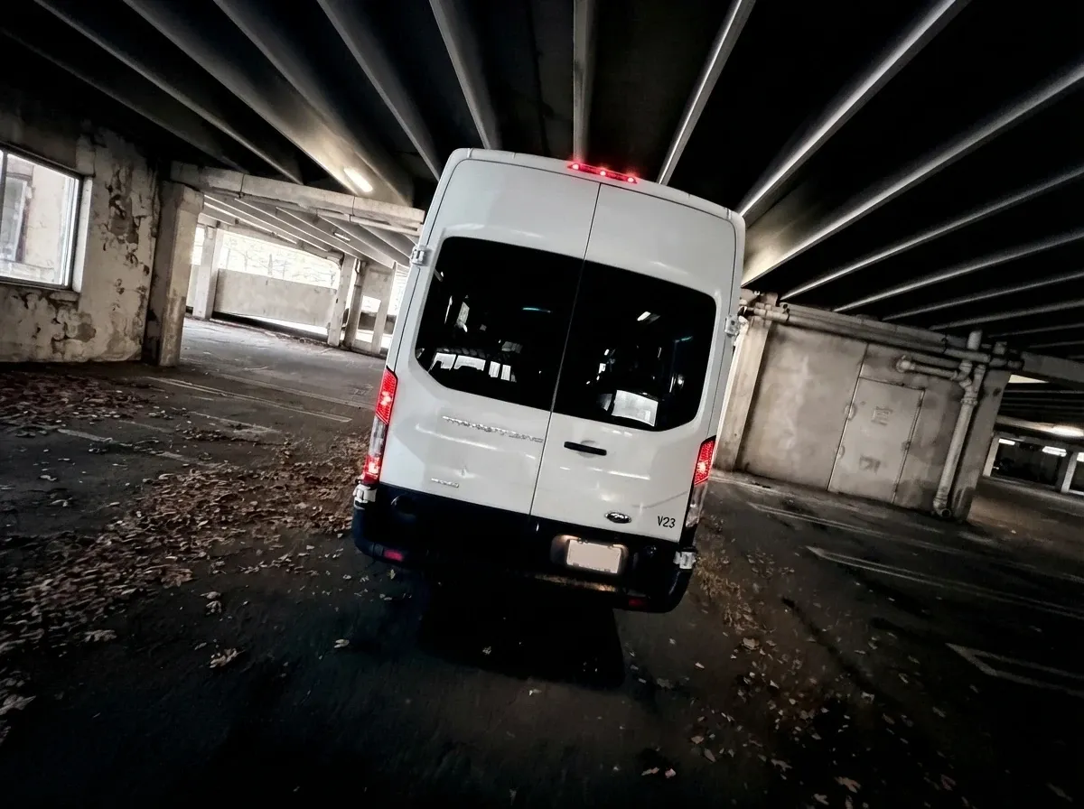 White Ford Transit Van, angle 2