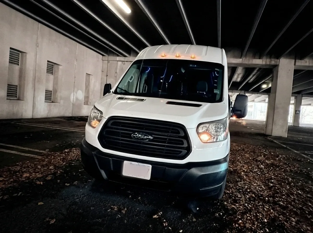 White Ford Transit Van, angle 4