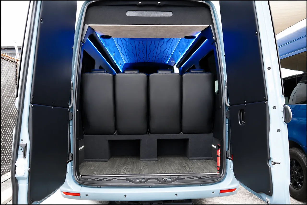 Gray Luxury Sprinter Shuttle Van cabin view, angle 3