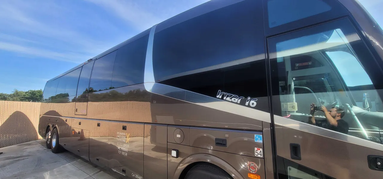 Brown Irizar Motorcoach exterior angle with tinted windows