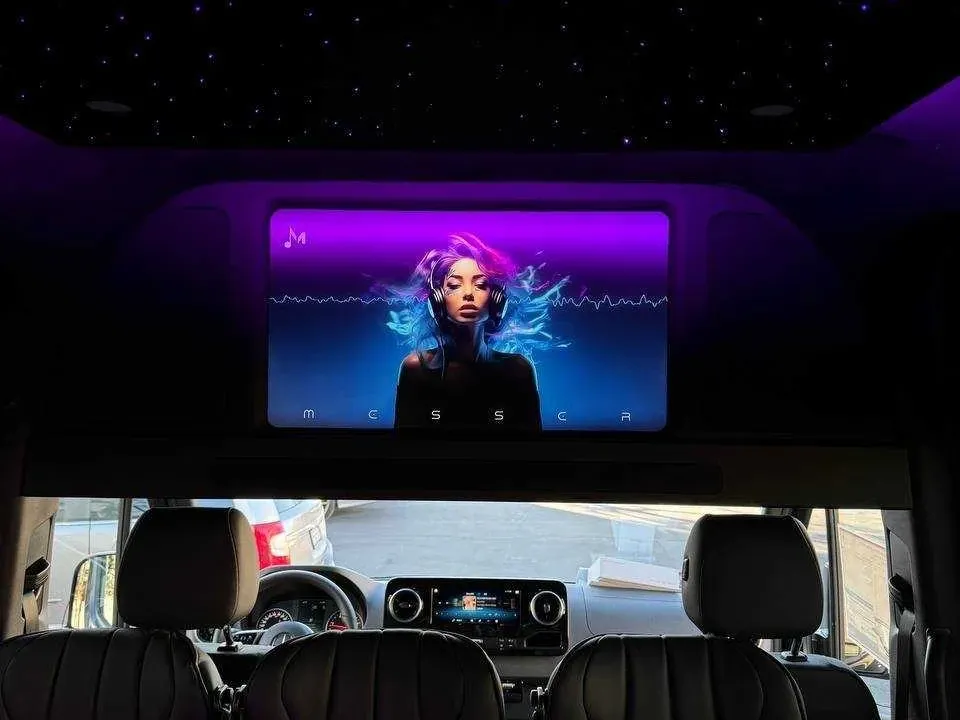 Black Mercedes-Benz Executive Sprinter, angle 2