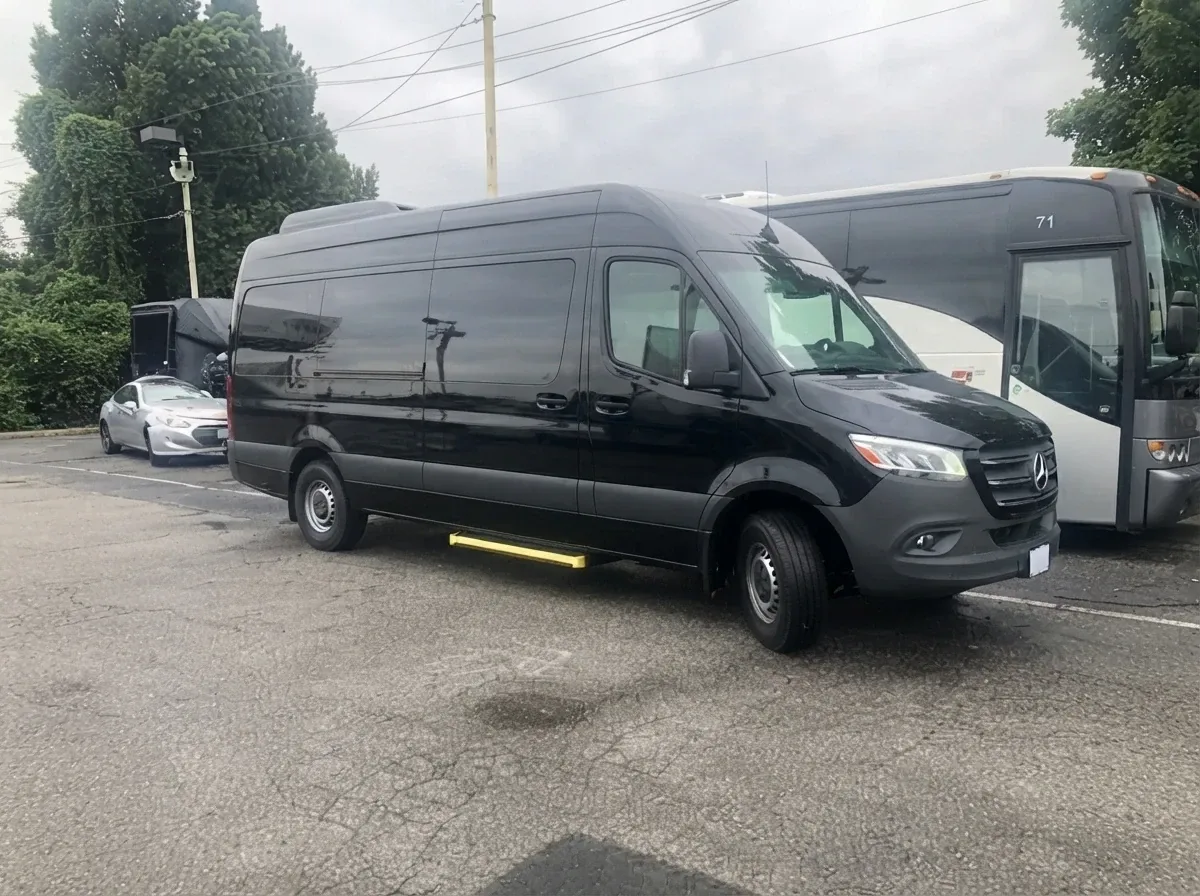 Black Mercedes-Benz Executive Sprinter, angle 2