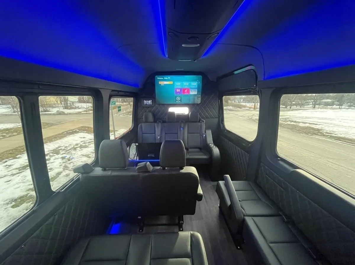 Black Mercedes-Benz Executive Sprinter, angle 2