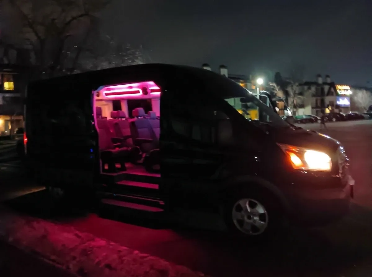 Black Mercedes-Benz Executive Sprinter, angle 3