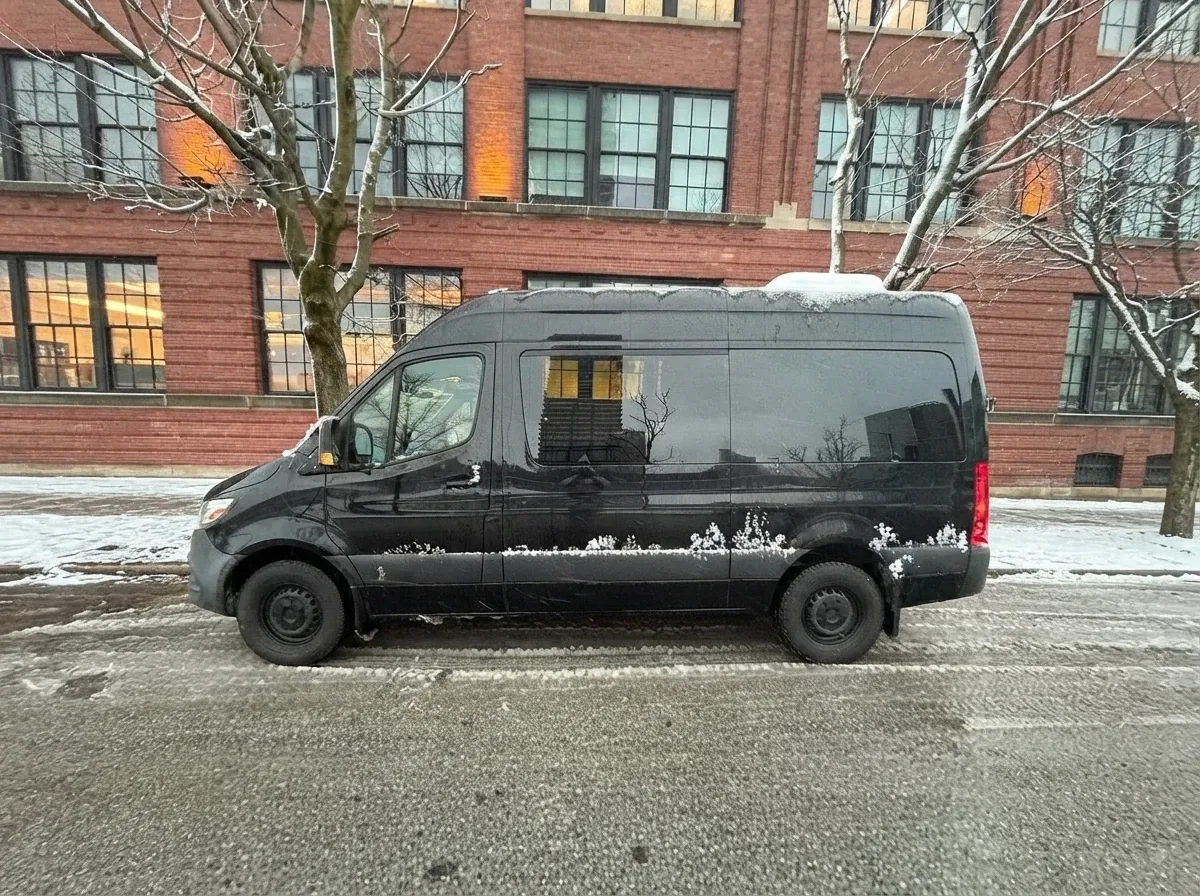 Black Mercedes-Benz Executive Sprinter, angle 2