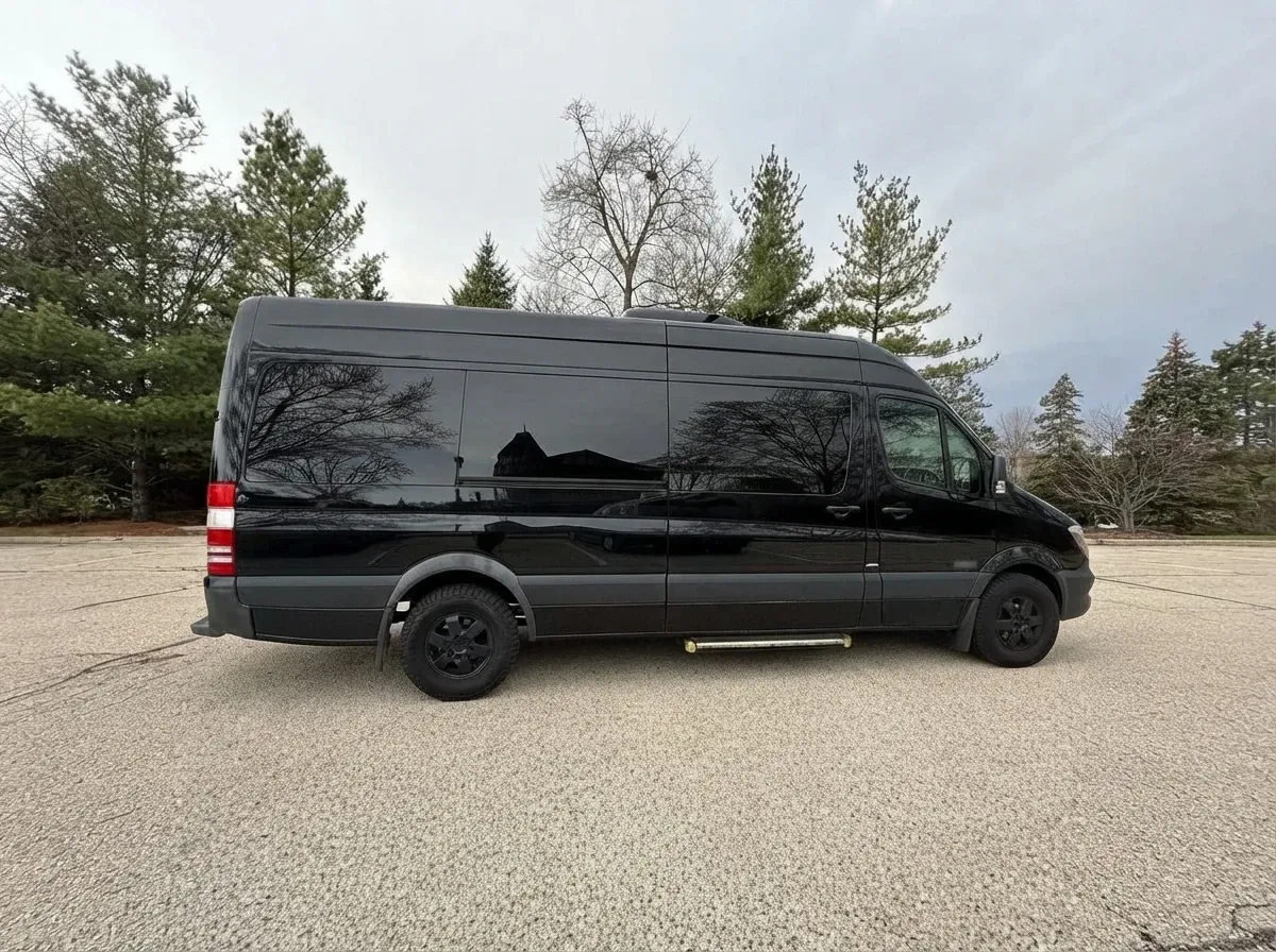 Black Mercedes-Benz Executive Sprinter, angle 3