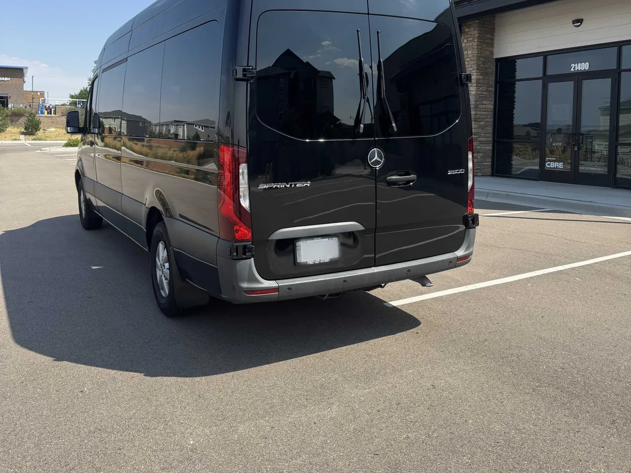 Black Mercedes-Benz Executive Sprinter, angle 4