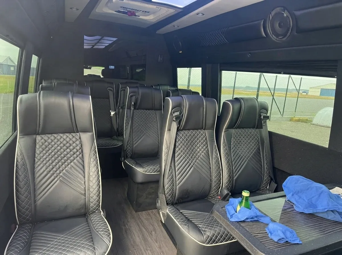 Black Mercedes-Benz Executive Sprinter, angle 4