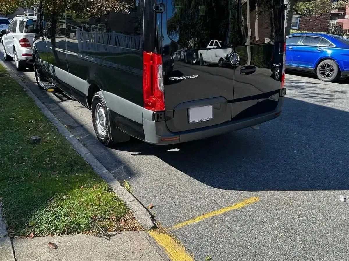 Black Mercedes-Benz Sprinter, angle 3