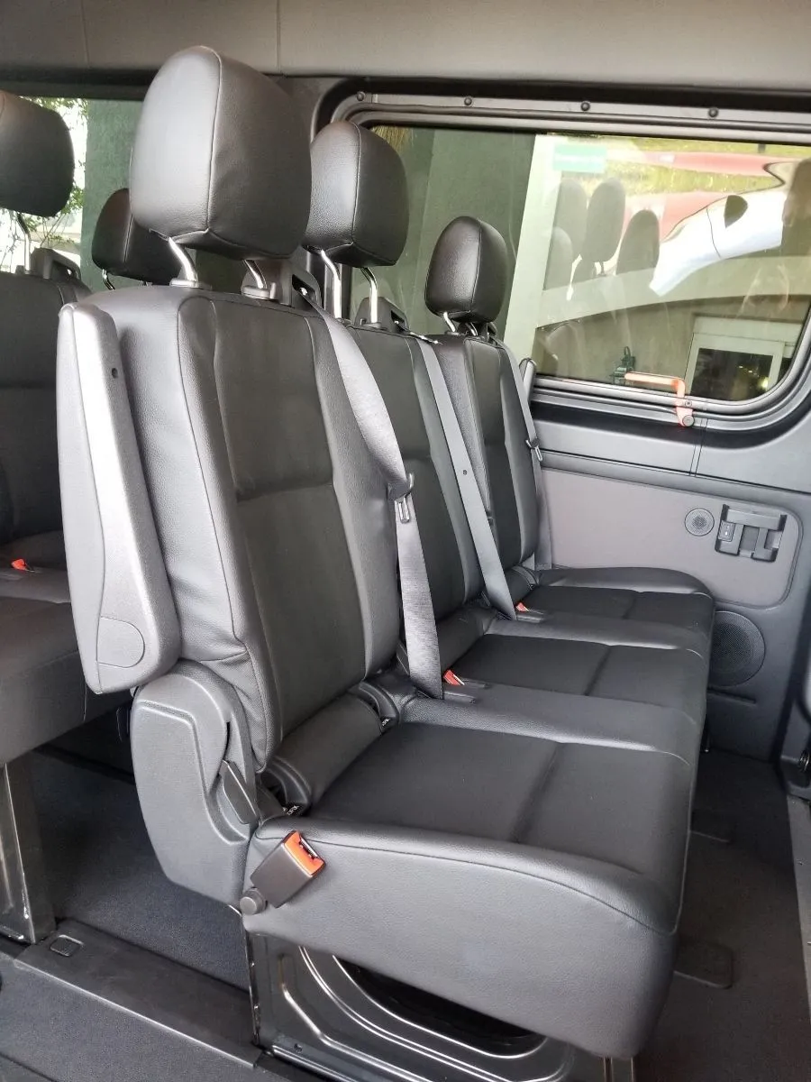 Black Mercedes-Benz Sprinter Passenger Van, angle 3