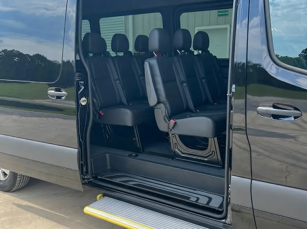 Black Mercedes-Benz Sprinter Shuttle Van, angle 3