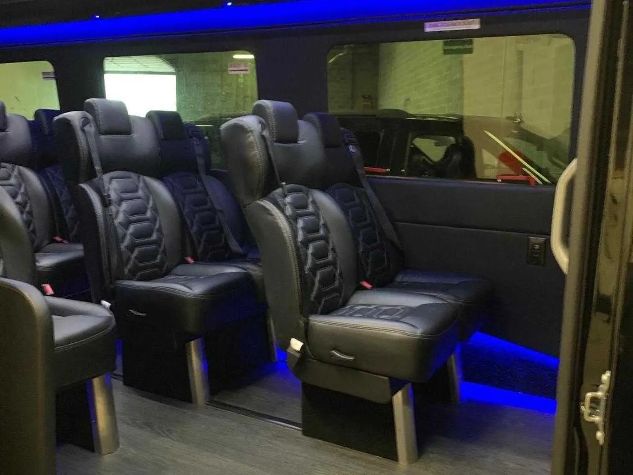 Black Mercedes-Benz Sprinter Van, angle 3