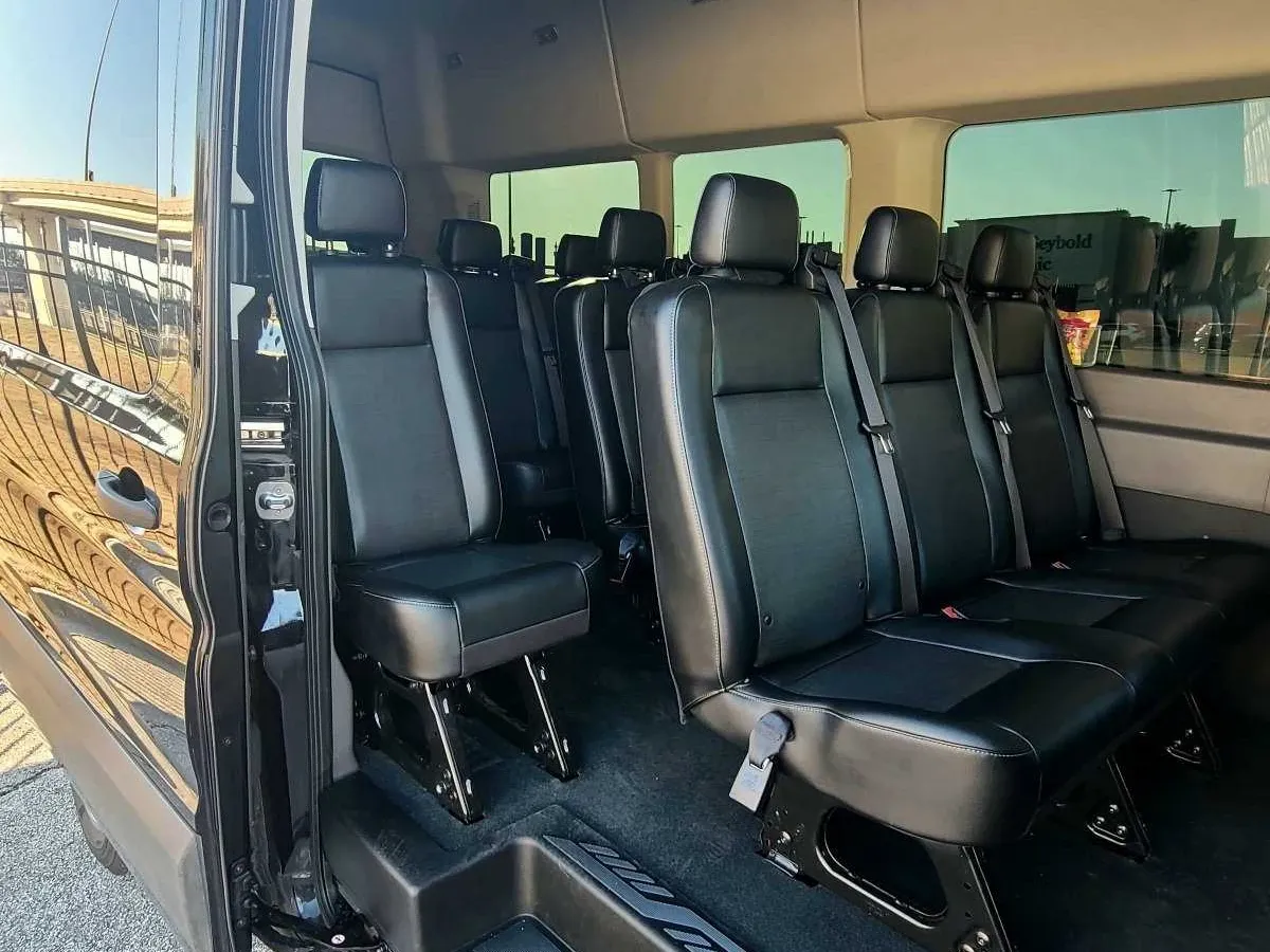 Black Mercedes-Benz Sprinter Van, angle 3