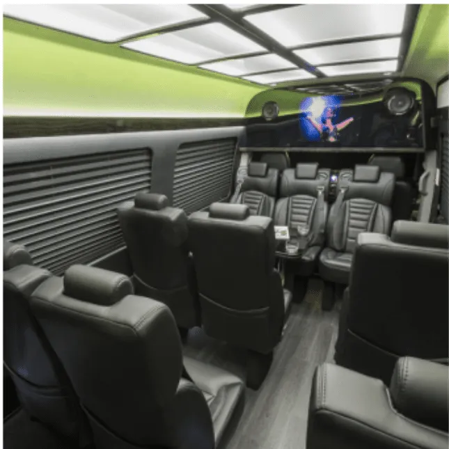 Mercedes-Benz Executive Sprinter cabin view with captain's chairs, window shades and LED ceiling lighting