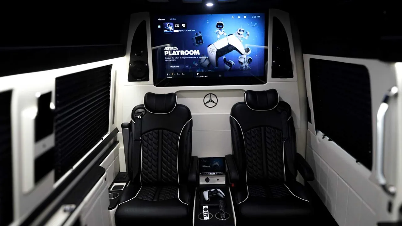 Mercedes-Benz Jet Sprinter cabin view, angle 2 with captain's chairs, window shades and TV screens
