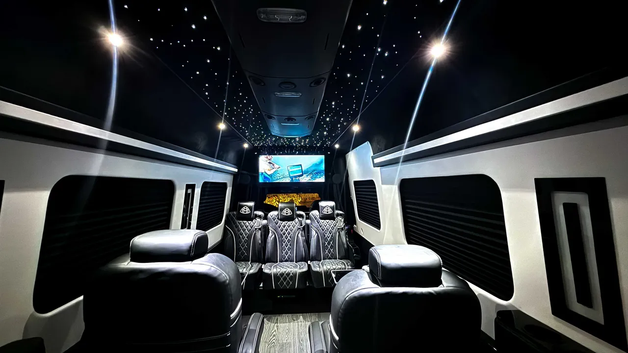 Mercedes-Benz Jet Sprinter Limousine cabin view with captain's chairs, starlight or fiber-optic ceiling and TV screens