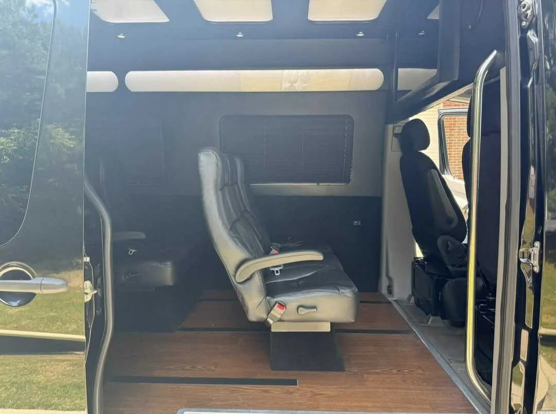 Mercedes-Benz Limousine Sprinter Mercedes-Benz Limousine Sprinter cabin view with LED ceiling lighting and wood-look flooring