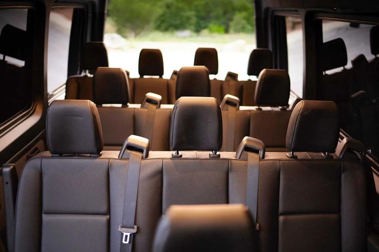 Mercedes-Benz Sprinter cabin view with passenger seat belts