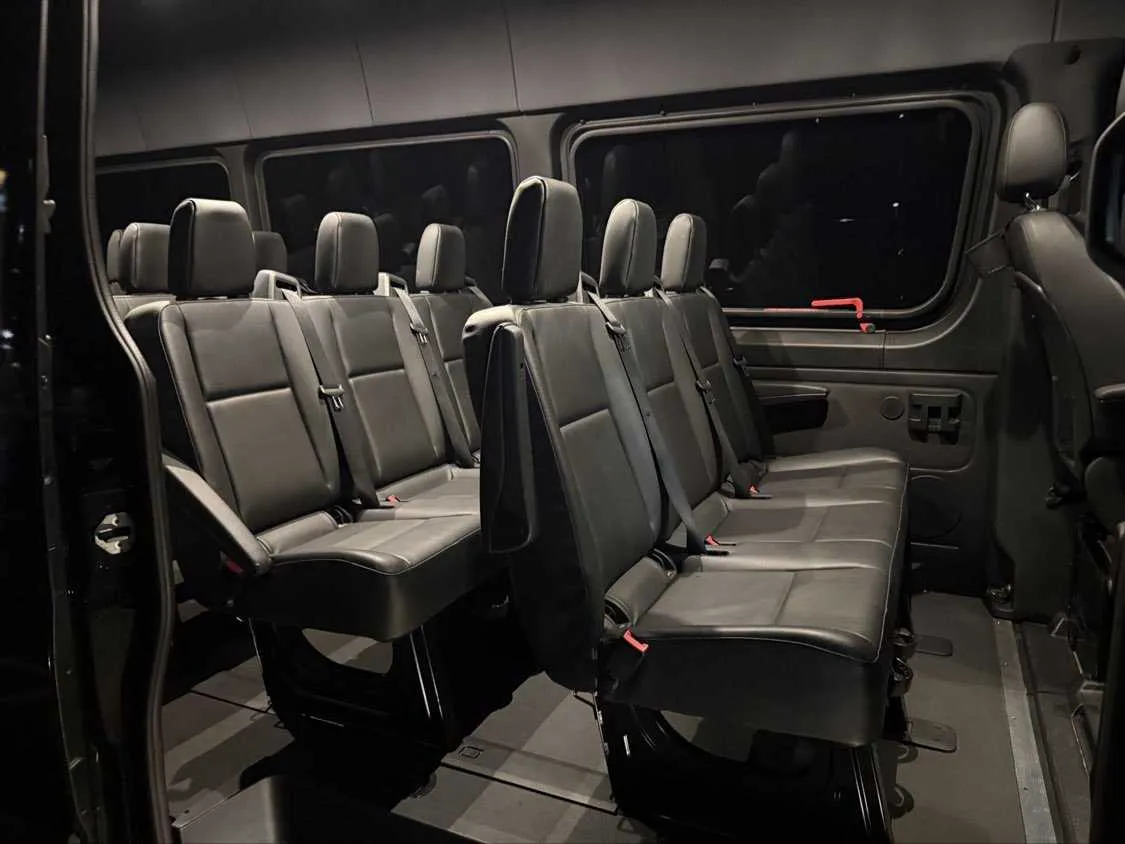 Mercedes-Benz Sprinter cabin view with passenger seat belts