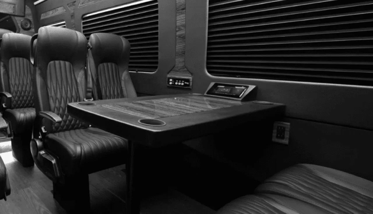 Mercedes-Benz Sprinter Van Mercedes-Benz Sprinter Van cabin view with captain's chairs, passenger tables and cup holders