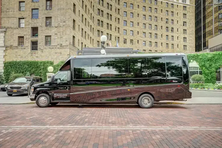 23 Passenger Mini Coach Black 23 Passenger Mini Coach with tinted windows