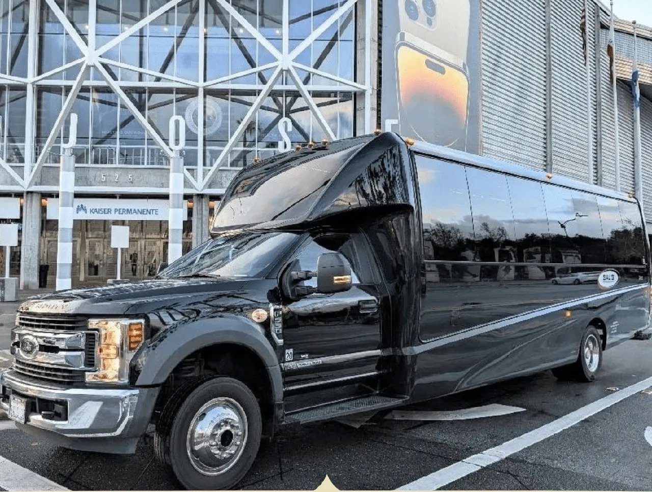 Black 27 Passenger Mini Coach with tinted windows