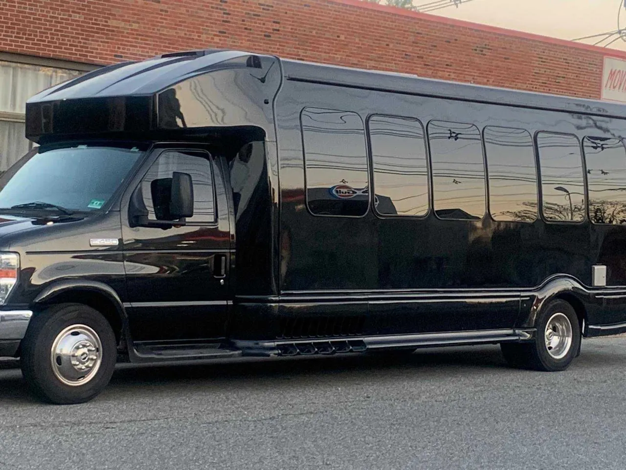 24 Passenger Mini Coach Black 24 Passenger Mini Coach with tinted windows