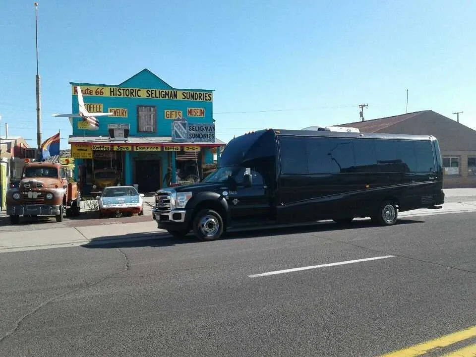 Black 28 Passenger Mini Coach with tinted windows