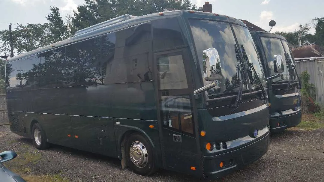 38 Passenger Mini Coach exterior angle with tinted windows