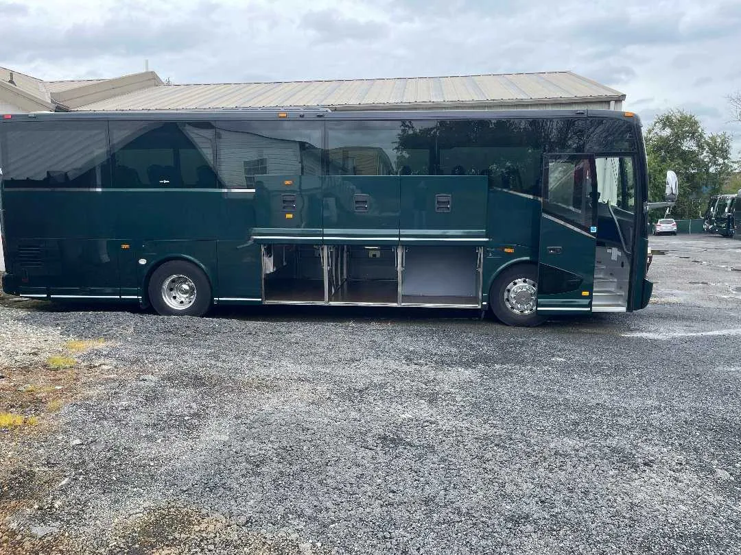 38 Passenger Mini Coach with tinted windows and under-floor luggage bays