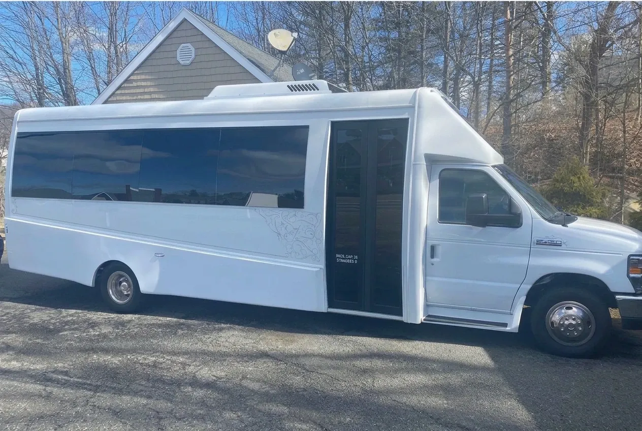 24 Passenger Mini Coach Black 24 Passenger Mini Coach to rent