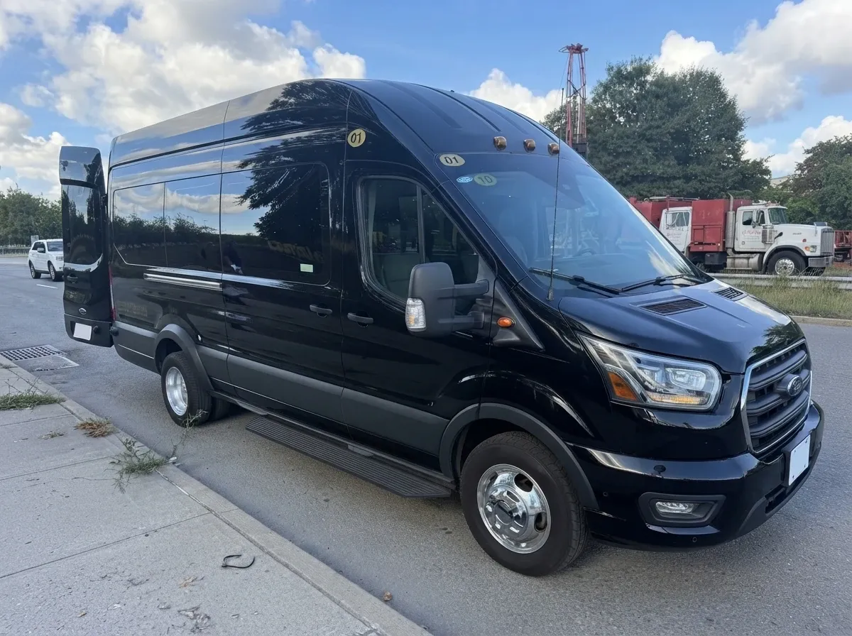 Black 14 Passenger Mini Van, angle 2