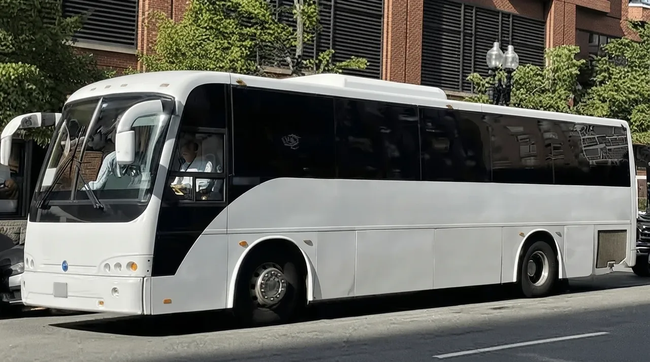 White 40 Passenger Motor Coach to rent