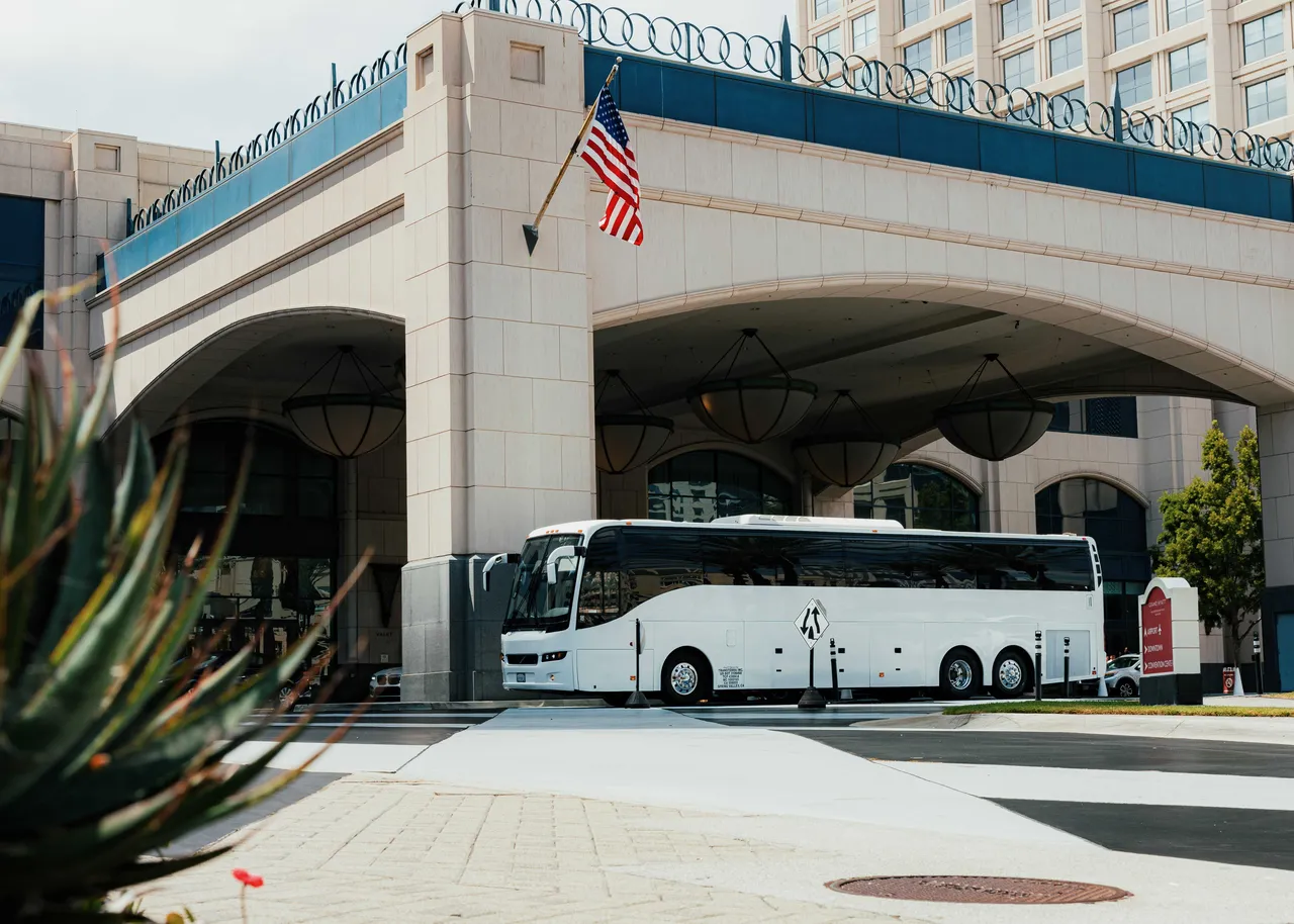 56 Passenger Motor Coach White 56 Passenger Motor Coach to rent