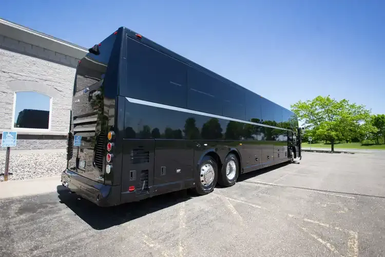 Black 56 Passenger Motorcoach with tinted windows