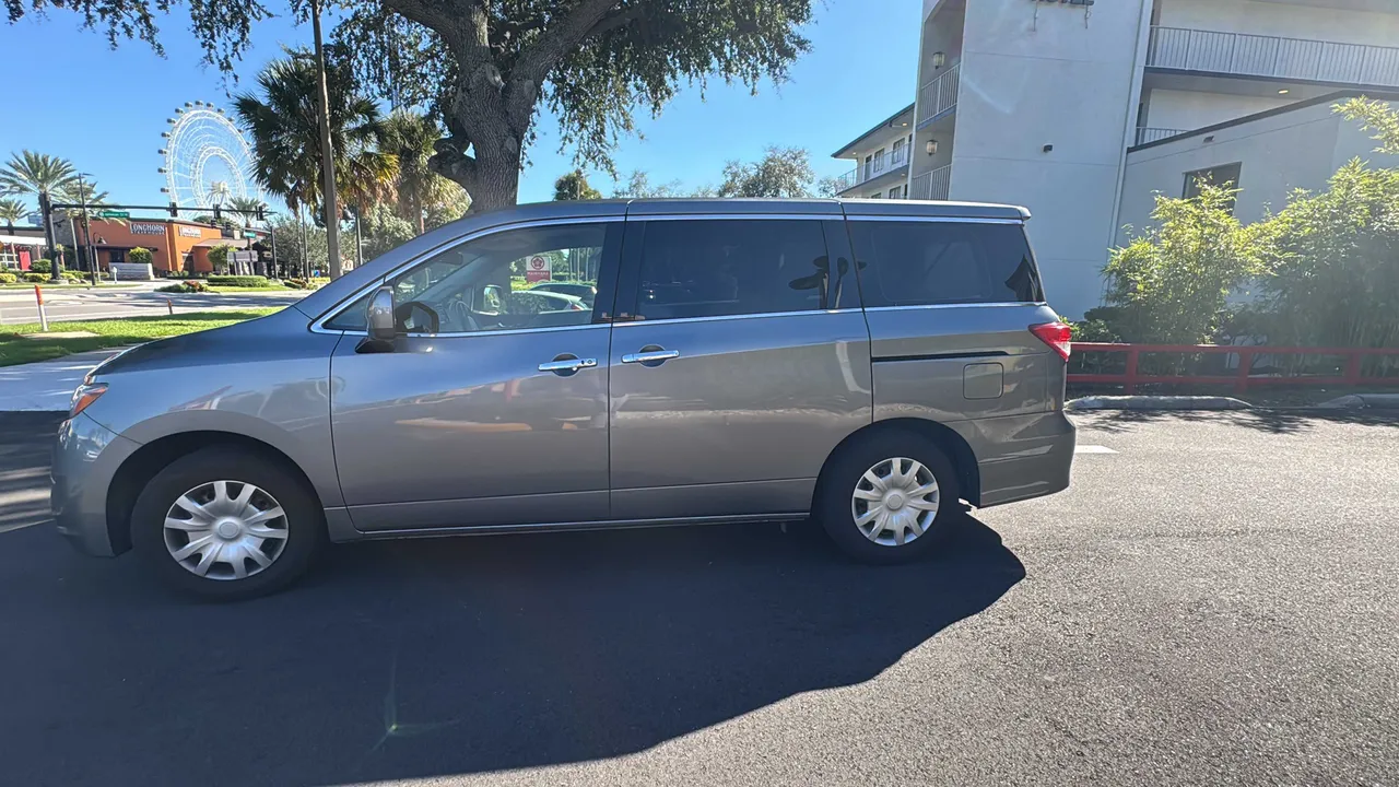 Gray Nissan Quest to rent
