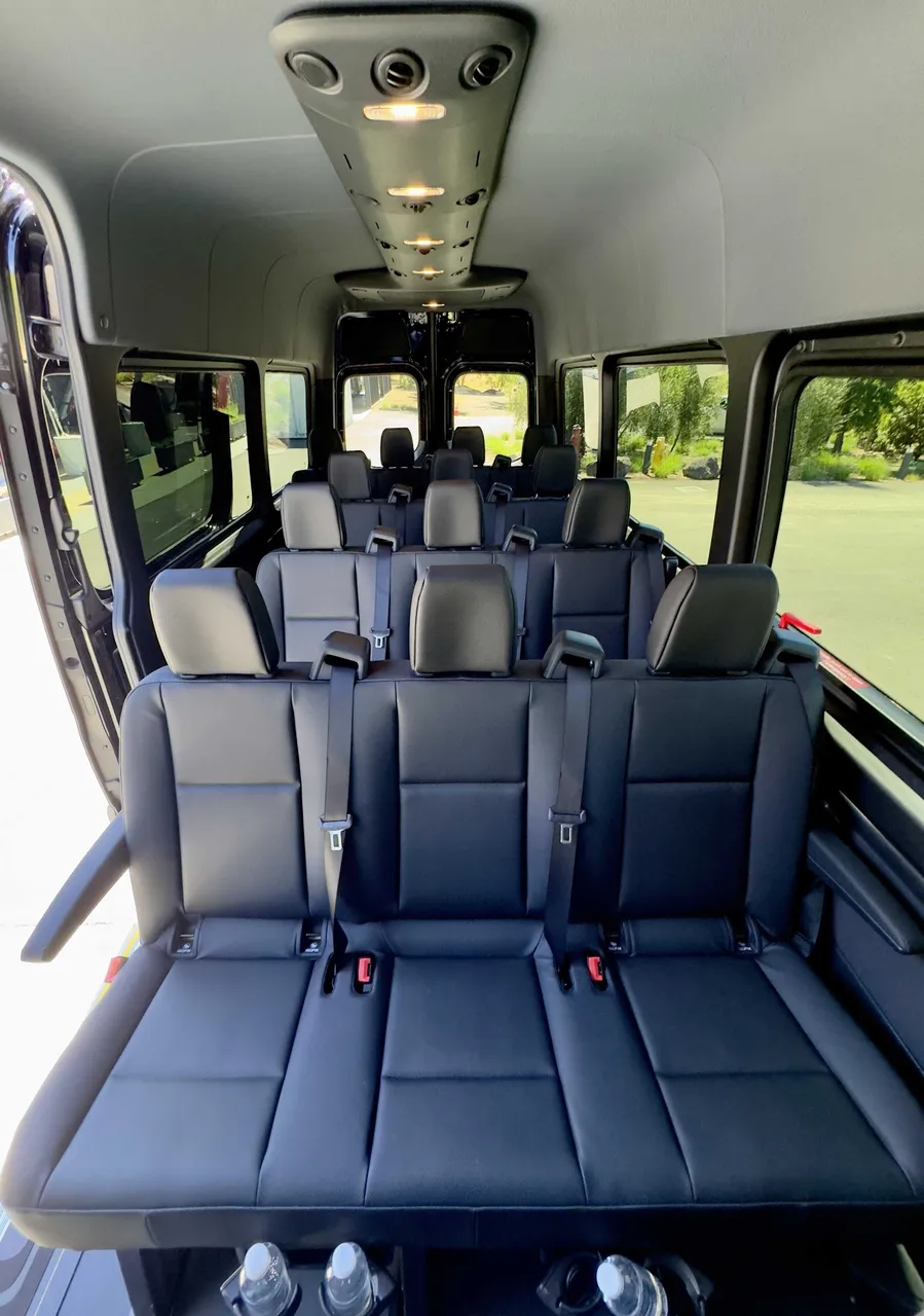Sprinter Shuttle cabin view, angle 2 with passenger seat belts