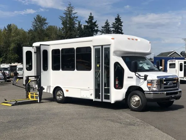 Black VIP Executive ADA Mini Coach 14 Passenger (ADA Wheelchair Lift) exterior angle, angle 4