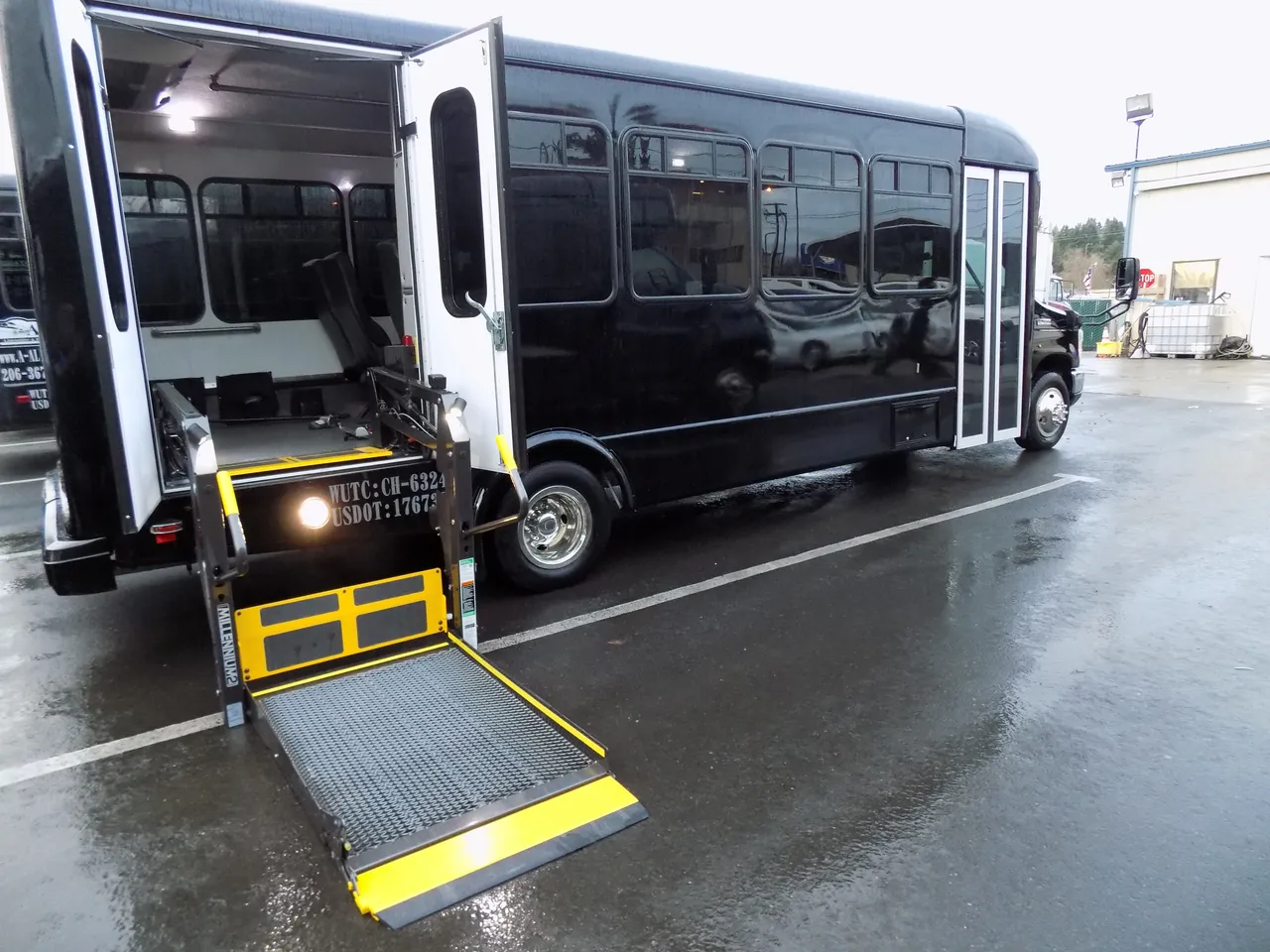 Black VIP Executive ADA Mini Coach with Wheelchair Lift with wheelchair lift