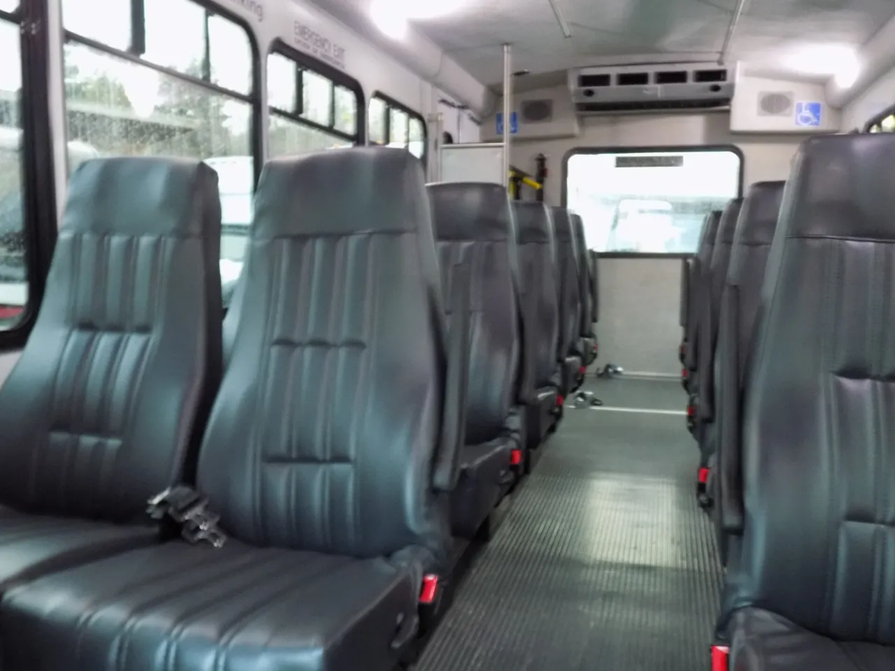 VIP Executive ADA Mini Coach with Wheelchair Lift cabin view, angle 4 with passenger seat belts