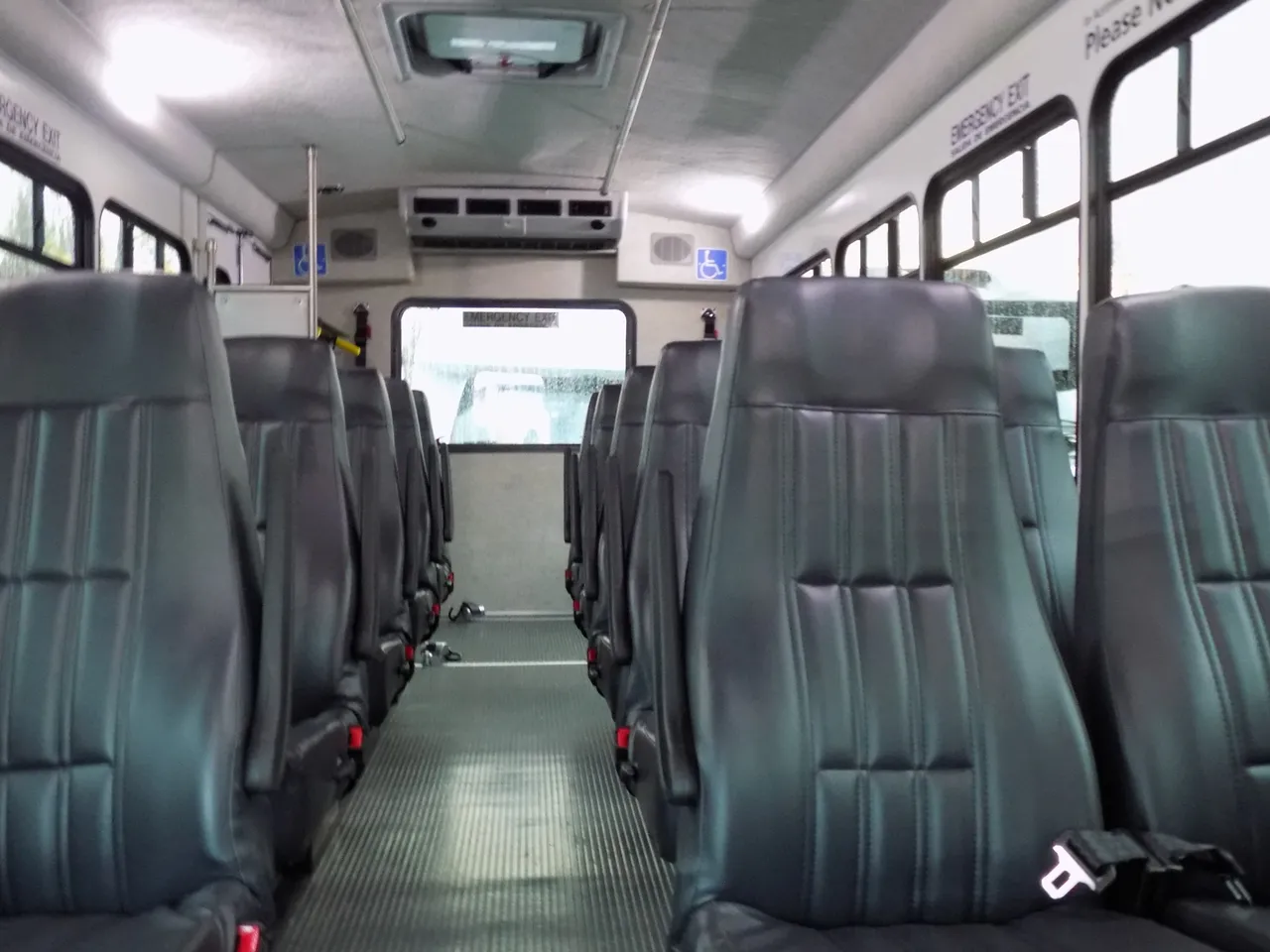 VIP Executive ADA Mini Coach with Wheelchair Lift cabin view with passenger seat belts